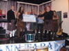 Ted & Albannach handing over the cheque of £1230 for charity, this was for the Schiehallion Ward at Yorkhill Hospital during the gig in Maryhill, This was Crann Tara organised.